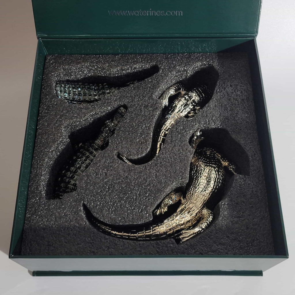 Endurance Alligator Set by Waterines — 3D sculpted magnetic resin alligator sculptures hunt in a glass coffee table.