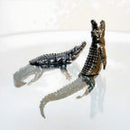 Endurance Alligator Set by Waterines — 3D sculpted magnetic resin alligator sculptures hunt in a glass coffee table.