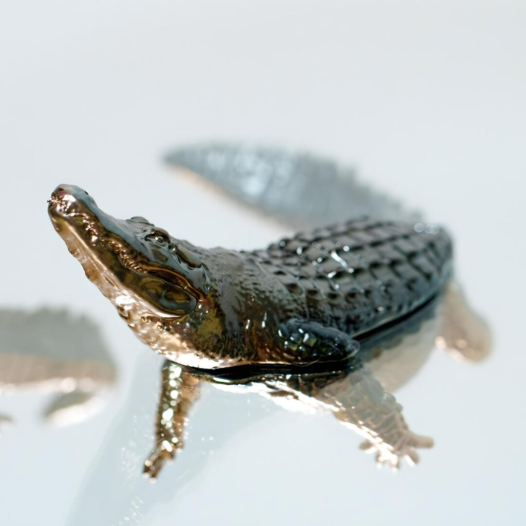 Endurance Alligator Set by Waterines — 3D sculpted magnetic resin alligator sculptures hunt in a glass coffee table.