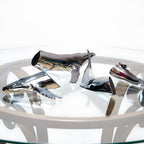 Euphoria Whale Set by Waterines — 3D sculpted magnetic resin whale sculptures breach through a glass coffee table.