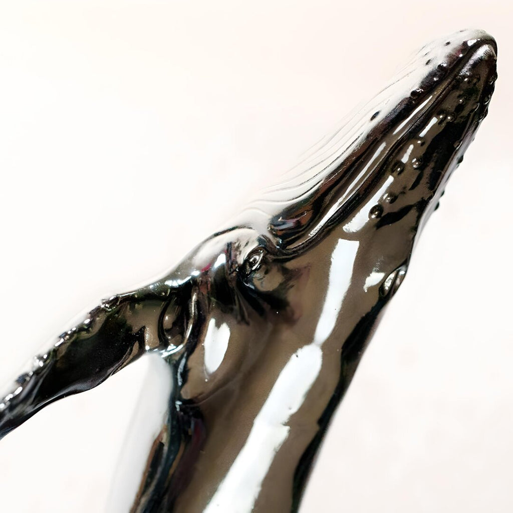 Euphoria Whale Set by Waterines — 3D sculpted magnetic resin whale sculptures breach through a glass coffee table.